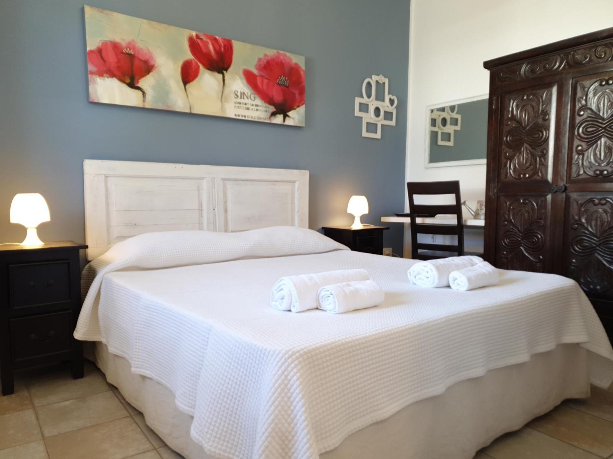 Blue Dolphin Guest House Alghero Bagian luar foto