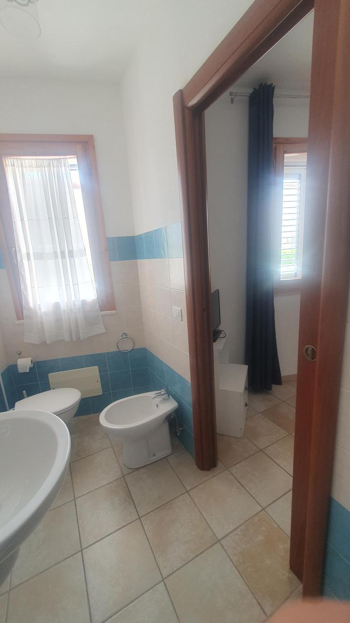 Blue Dolphin Guest House Alghero Bagian luar foto