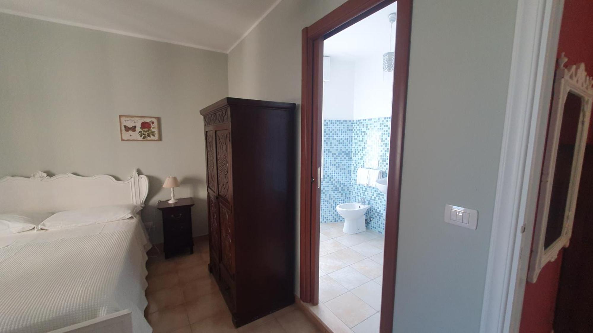 Blue Dolphin Guest House Alghero Bagian luar foto